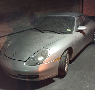Illustration for article titled What Do I Do About The Abandoned
Porsche 911 In My Parking Garage?